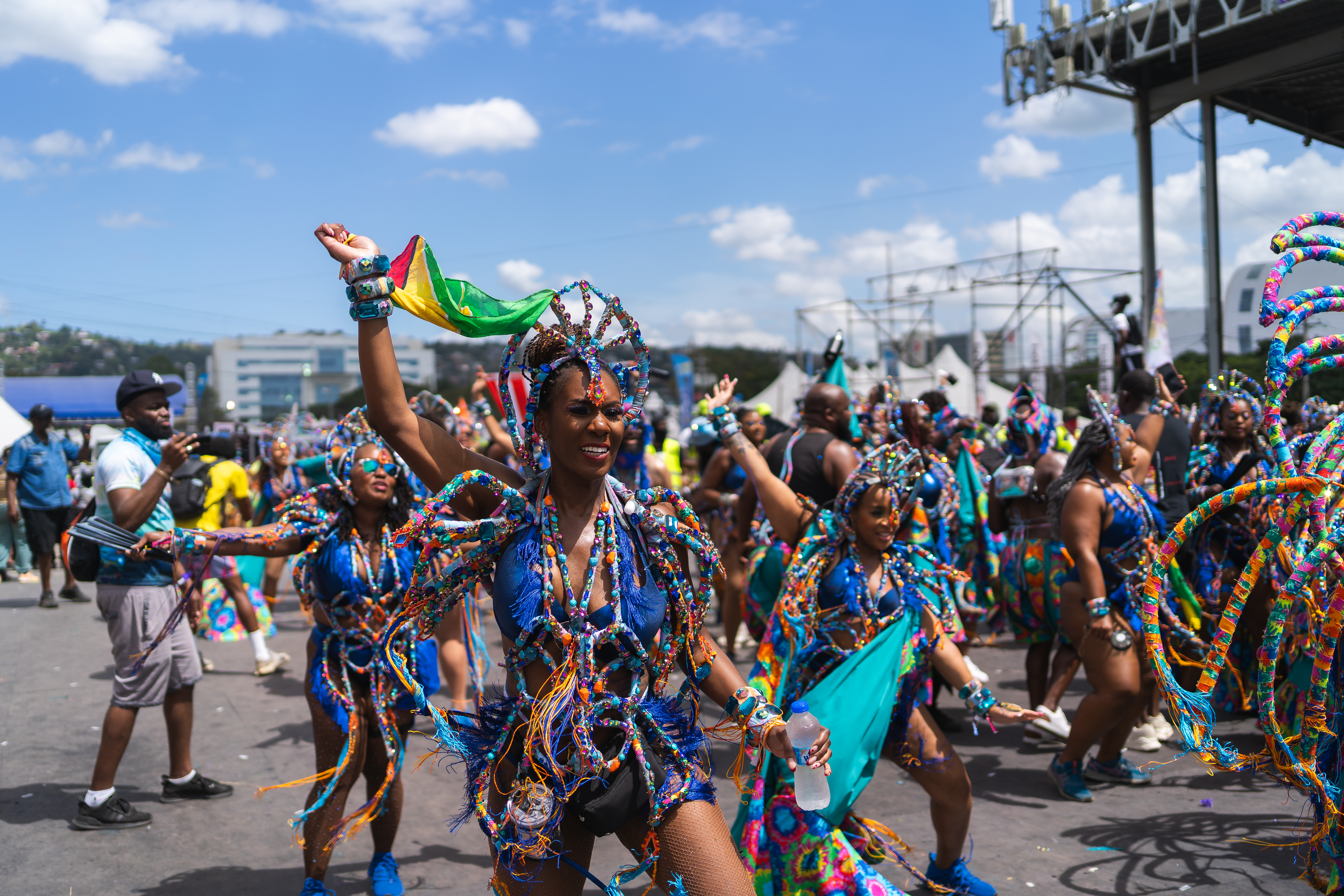 Masqueraders in full costume on the road at carnival